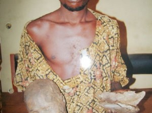 WHAT! [Photo] Man Caught Exhuming Corpse From Graveyard In Ogun State