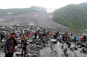 Photos: Many Dead, Scores Missing Hours After Landslide Buries Chinese Village