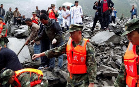 Photos: Many Dead, Scores Missing Hours After Landslide Buries Chinese Village