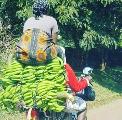 Photo Of The Day: How Did This Woman Get On This Okada?