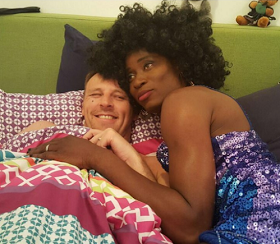 Bisi Alimi Shares Photo Of Himself As A Woman With His Fiance In Bed