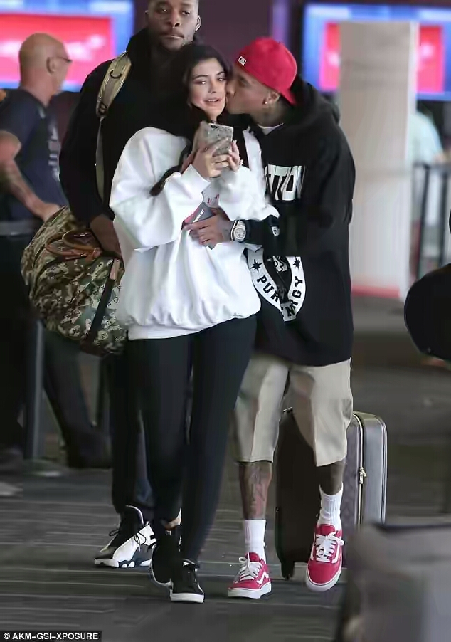Tyga Can't Seem To Get Enough Of Kylie As He Kisses Her Affectionately In Public