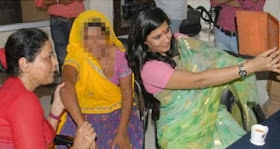 Indian Official Resigns After A Photo Of Her Smiling With A Rape Victim Goes Viral