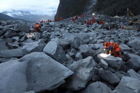 Photos: Many Dead, Scores Missing Hours After Landslide Buries Chinese Village