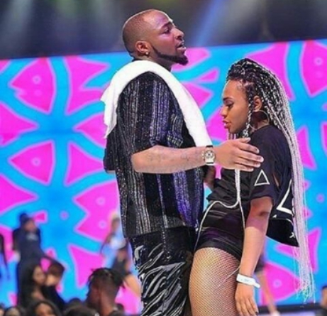 Caption This Photo Of A Slay Mama Rocking Davido On Stage (Best Caption Wins)