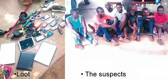 Photo: Policemen Arrest Robbers While Sharing Loot