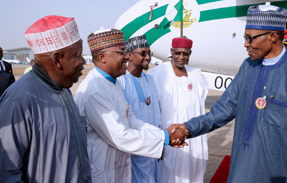 Buhari Returns Home From France