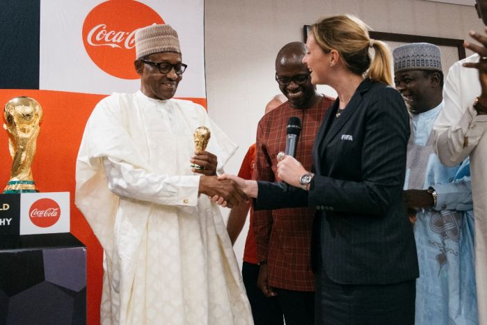 Photos:- The Moment The FIFA World Cup Trophy Was Lifted By The President Of Nigeria