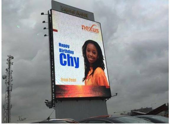 Nigerian Man Puts His Girlfriend's Picture On A Billboard To Celebrate Her Birthday