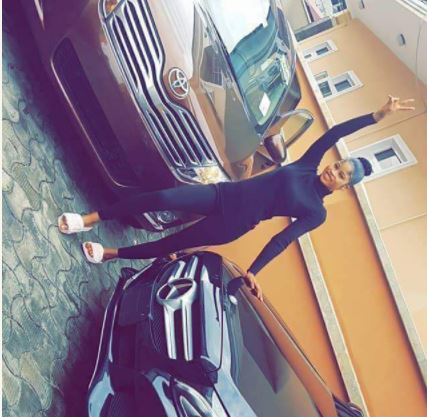 Slay Queen Acquires 2 Cars At The Same Time (Photos)