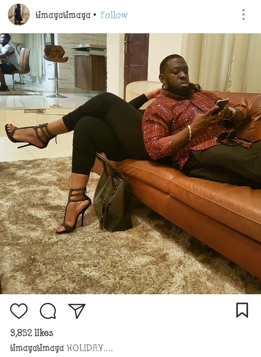 Timaya Finds Comfort In The Arms Of An Unknown Curvy Lady (Photo)