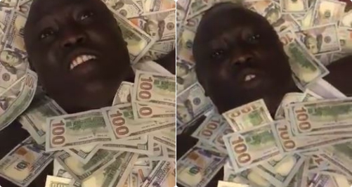 Another Hushpuppi, South Sudanese socialite shows off wads of dollar bills he claims is over $1m