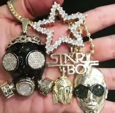Wizkid Gets Gold And Diamond Encrusted Chain As Birthday Gift