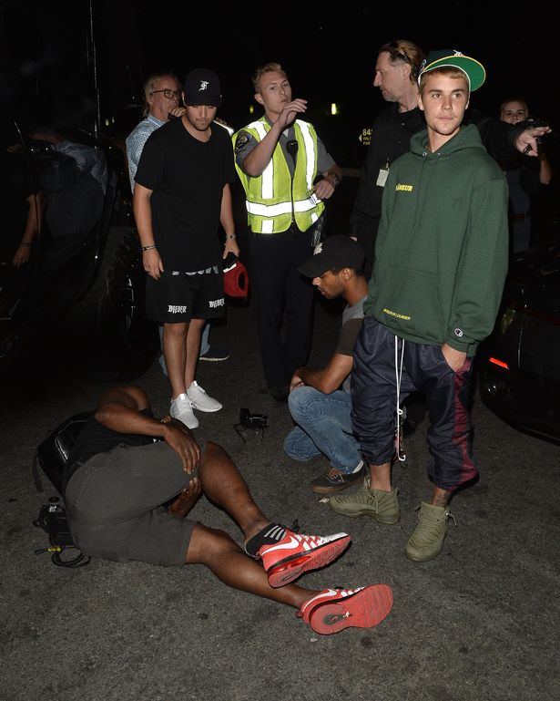 Justin Bieber Accidentally Hits Paparazzi With Car Minutes After Leaving Church (Photos)
