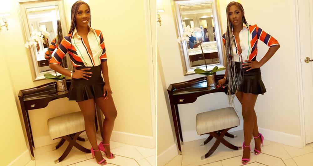 Tiwa Savage Stuns in sexy mini Skirt And Unbuttoned Shirt (Photos)