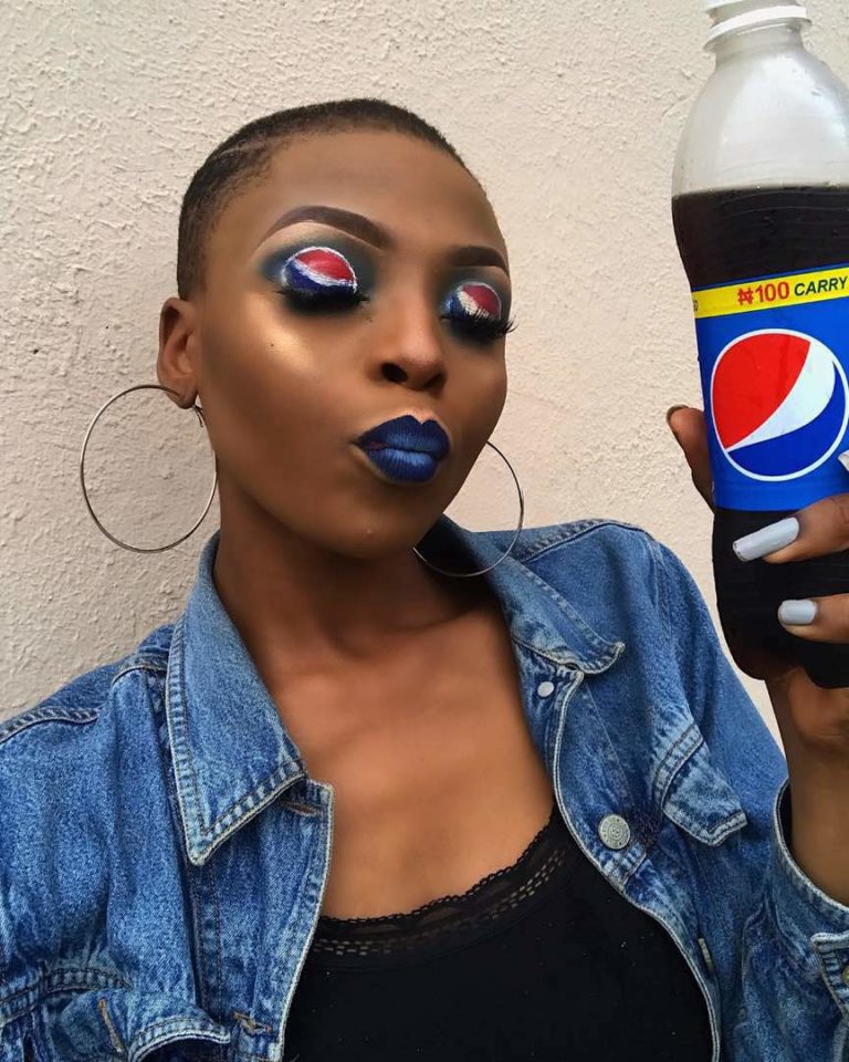 Checkout This Pictures Of A Nigerian Girl With Pepsi Logo Inspired Makeup