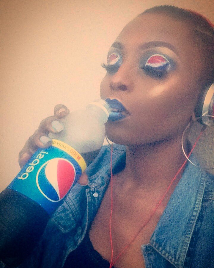 Checkout This Pictures Of A Nigerian Girl With Pepsi Logo Inspired Makeup