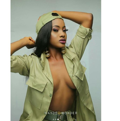 Lady who flashed n*ppls in NYSC crested vest, releases more sexy photos in NYSC khaki