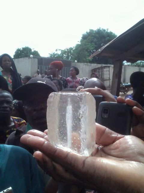 Members of a church in Ibadan claim that Jesus revealed himself in 'diamond stone' through a woman (photos)