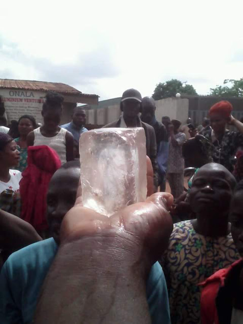 Members of a church in Ibadan claim that Jesus revealed himself in 'diamond stone' through a woman (photos)