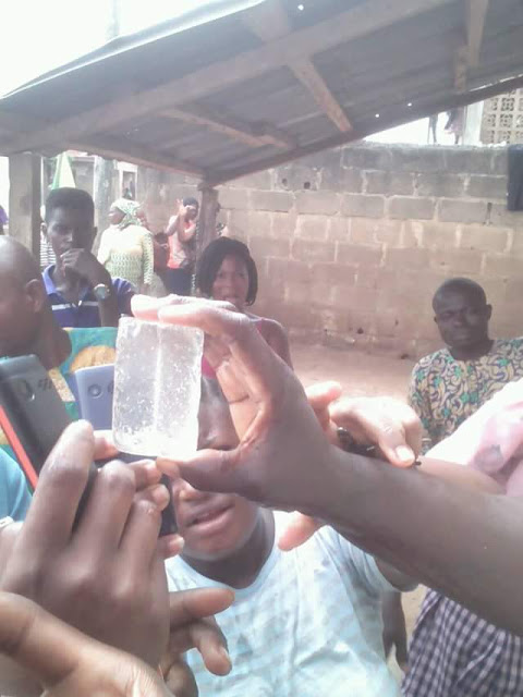 Members of a church in Ibadan claim that Jesus revealed himself in 'diamond stone' through a woman (photos)