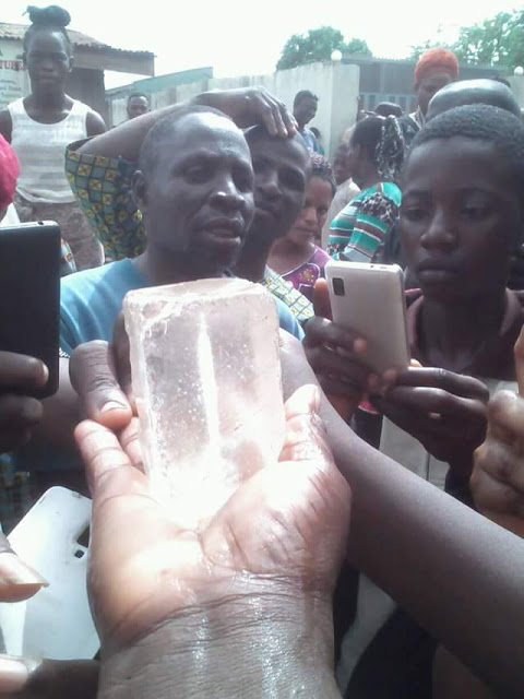 Members of a church in Ibadan claim that Jesus revealed himself in 'diamond stone' through a woman (photos)