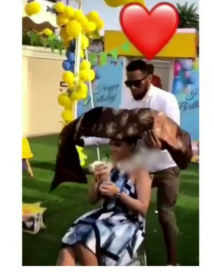 Hilarious moment Dbanj tried to tie his wife's 'gele' at his son's birthday party (Video)