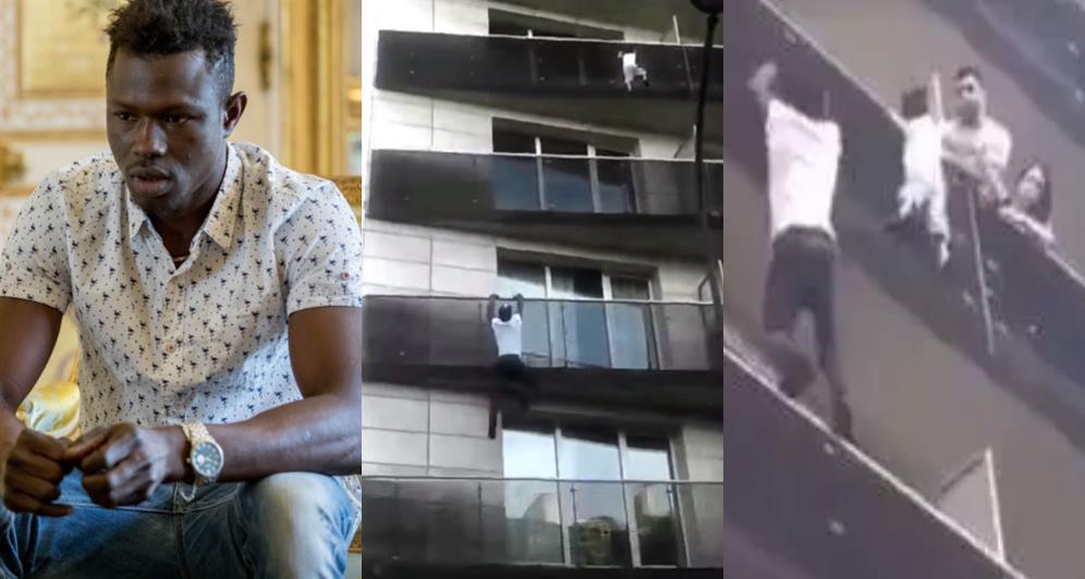 African 'Spiderman' scales building to rescue a child dangling from a balcony (video)
