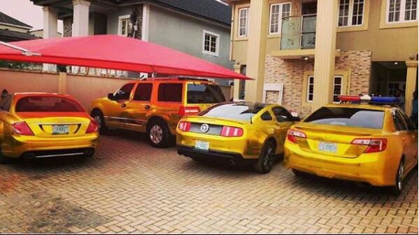 Kcee shows off his gold-painted exotic cars in his compound (Photos)