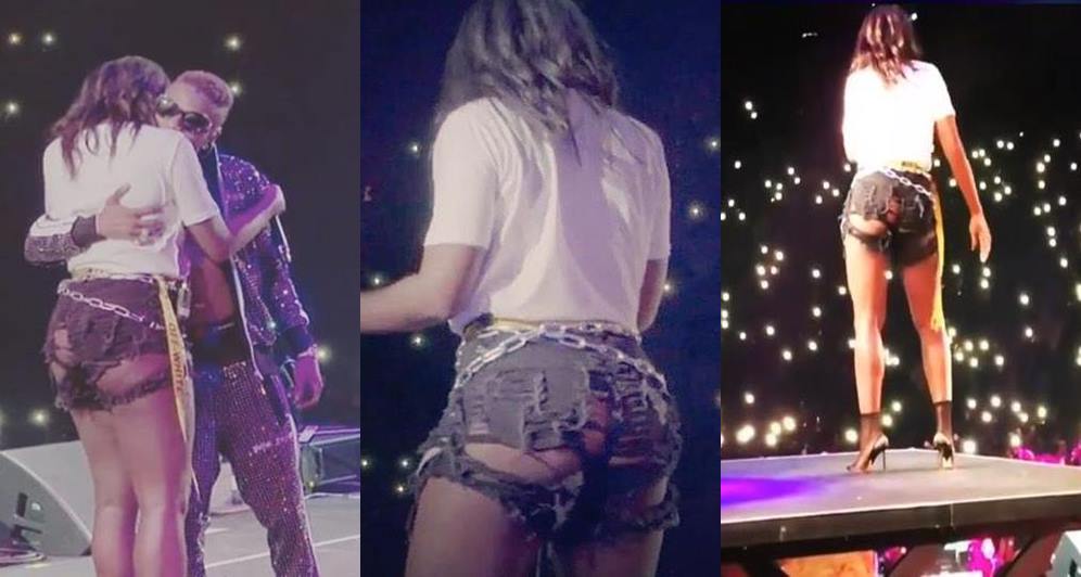 Fans react as Tiwa Savage flashes butt in ripped bum shorts at Wizkid's concert (Photos)