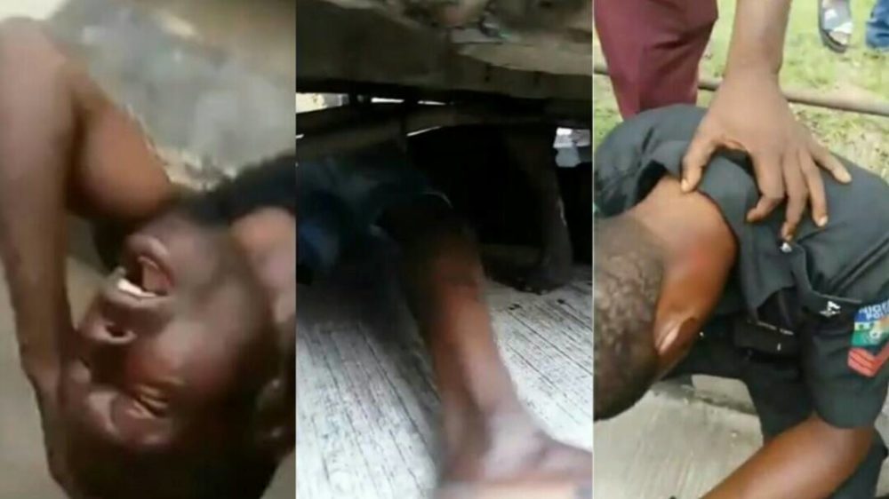 Conductor hides under his bus after stabbing a policeman in Lagos (Video)