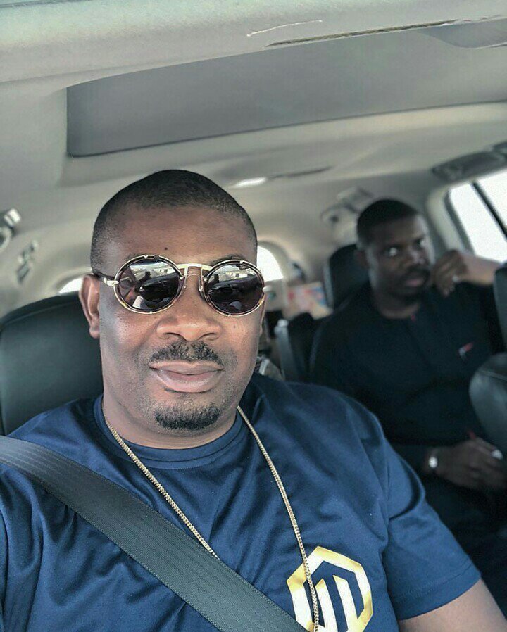 Don Jazzy poses in front of his Bentley, Efe, Khloe, Mr. P, others react