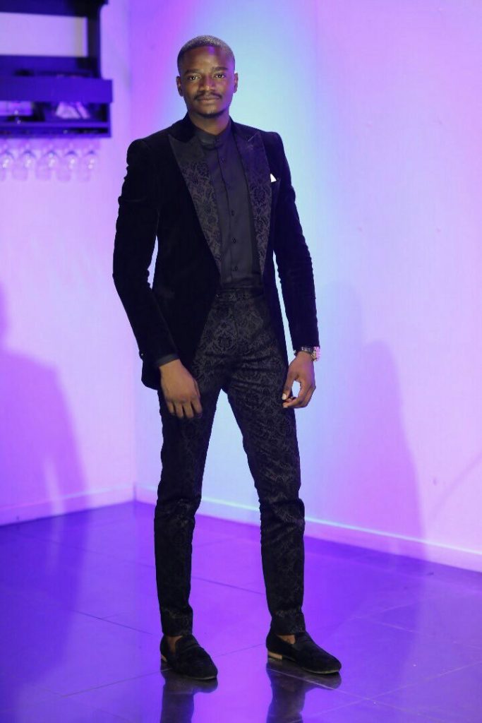 #BBNaija: Leo looks dapper as he rocks a black suit in latest photos