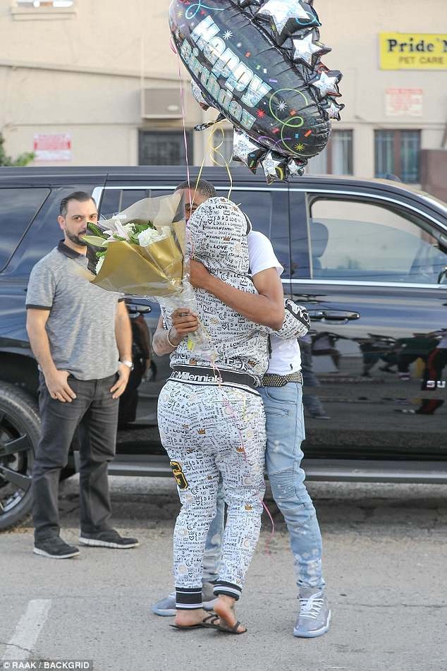 Blac Chyna's 18-year-old boyfriend surprises her with flowers as she celebrates 30th birthday (Photos)