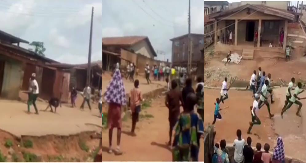 Secondary school students seen fighting with cutlasses, stones over girlfriend in Ibadan (Video)