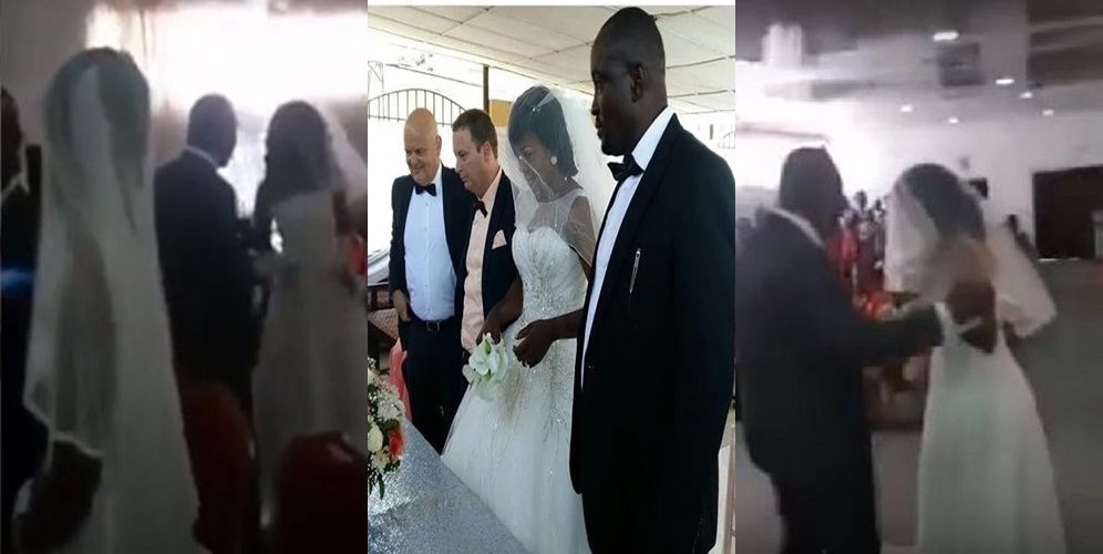 Angry 'side chick' dressed in bridal gown disrupts wedding ceremony of her lover (Video)