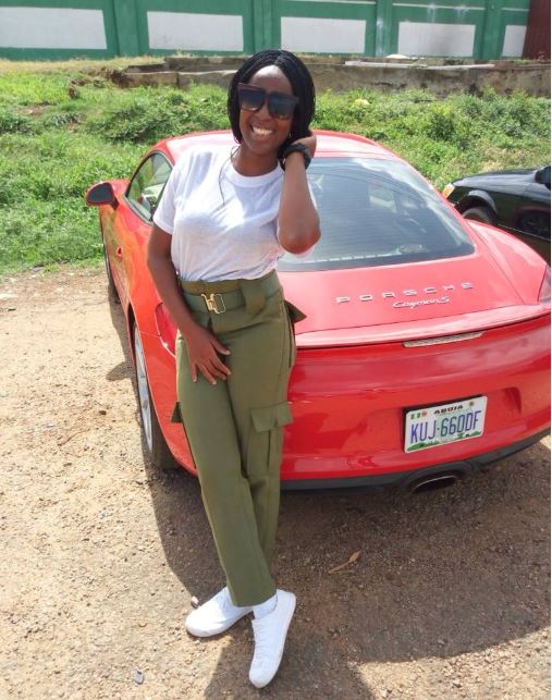 Female Corper Steps Out With A Porsche For Clearance In Abuja (Photos)
