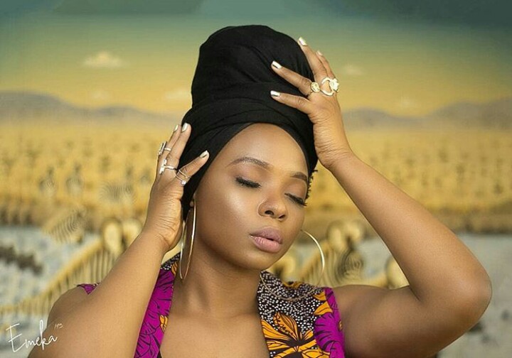 Yemi Alade and 'Church of Satan' fight dirty on Twitter, she attacks them with prayer