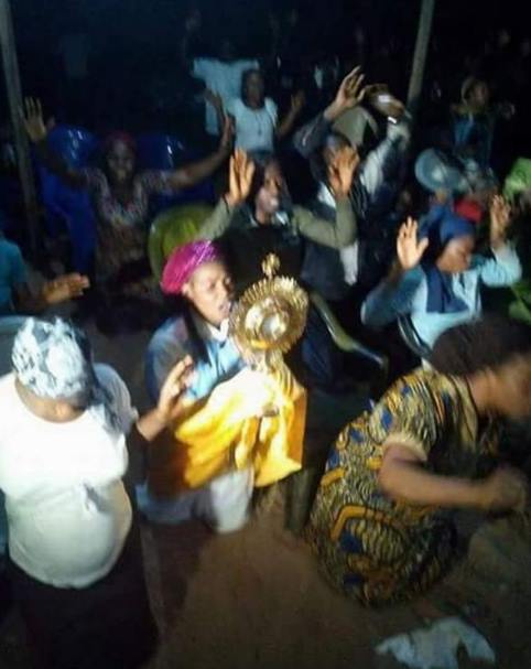 Outrage on social media as Female evangelist lifts the Catholic Monstrance holding the Blessed Sacrament (Photos)