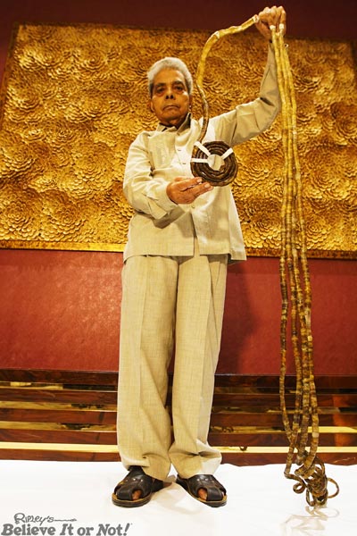 Photos: Man With World's Longest Fingernails Cuts Them Off After 66 Years