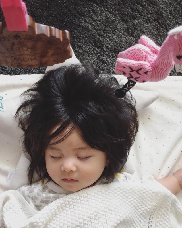 7-month-old baby breaks the internet with her amazing hair (Photos)