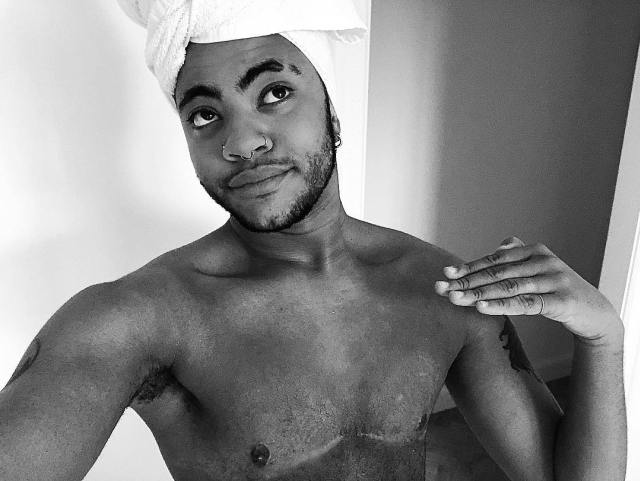 Sade Adu's transgender son shows off his chest after removing boobs