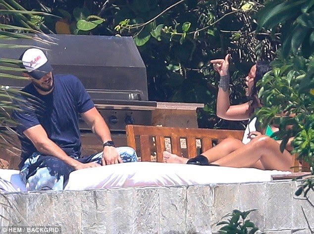 Rihanna having a heated exchange with billionaire boyfriend, Hassan Jameel in Mexico (Photos)