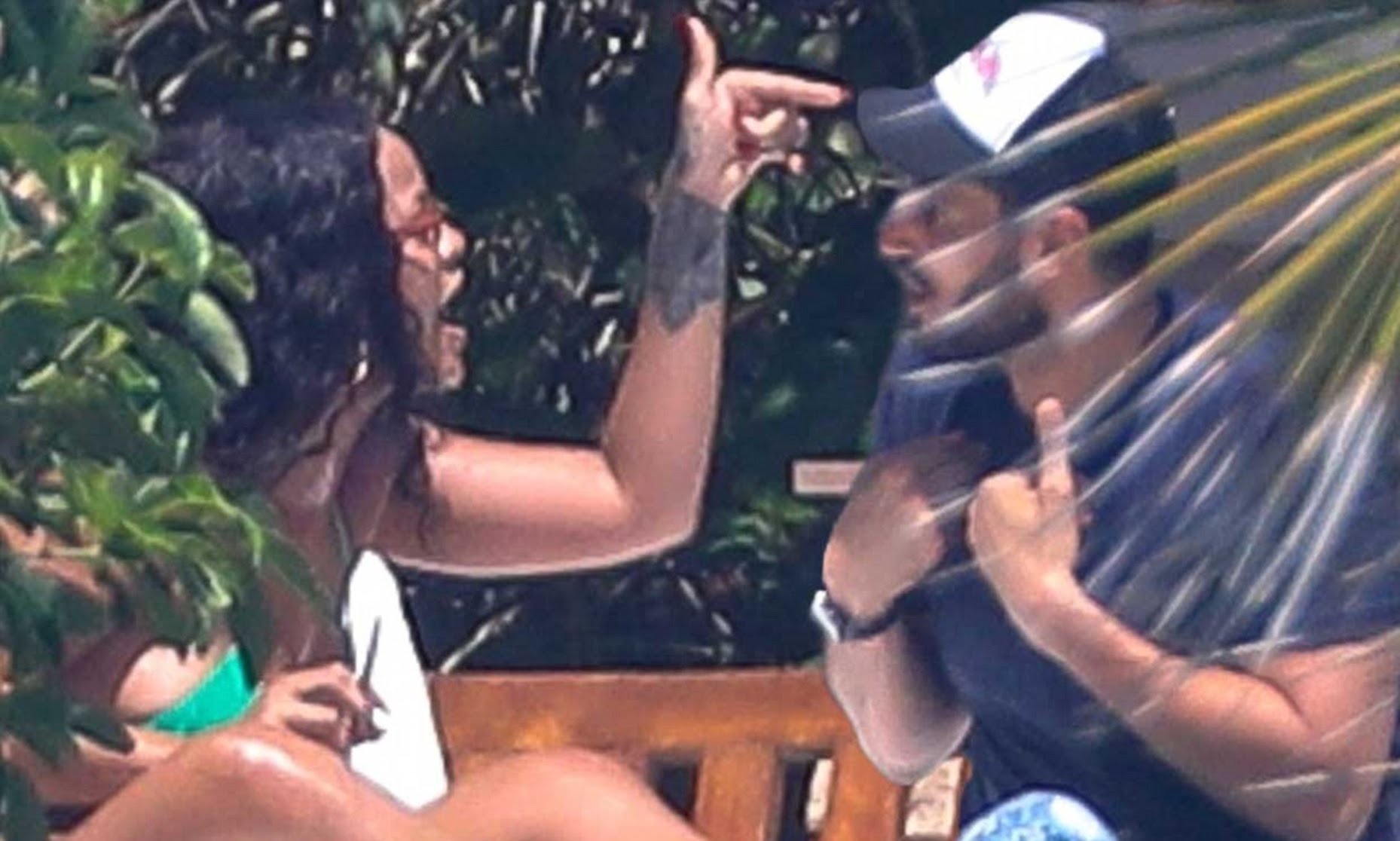 Rihanna having a heated exchange with billionaire boyfriend, Hassan Jameel in Mexico (Photos)