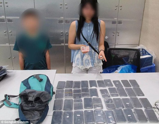 Mother forces her 9-year-old son to smuggle 40 iPhone Xs into China