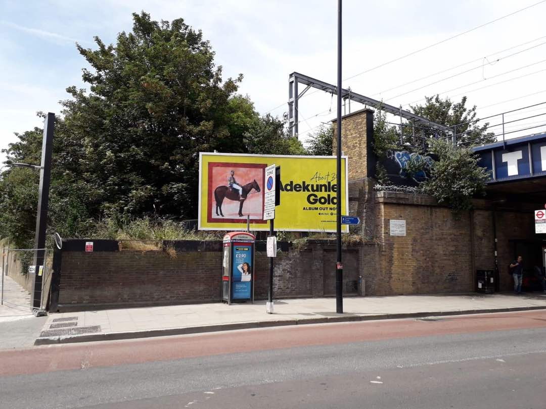 Adekunle Gold's sister in tears after seeing brother on billboards in London (Video)