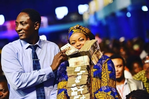 Money rains as Nigerian prophet blesses two former prostitutes with ₦7million to start life afresh (Photos)