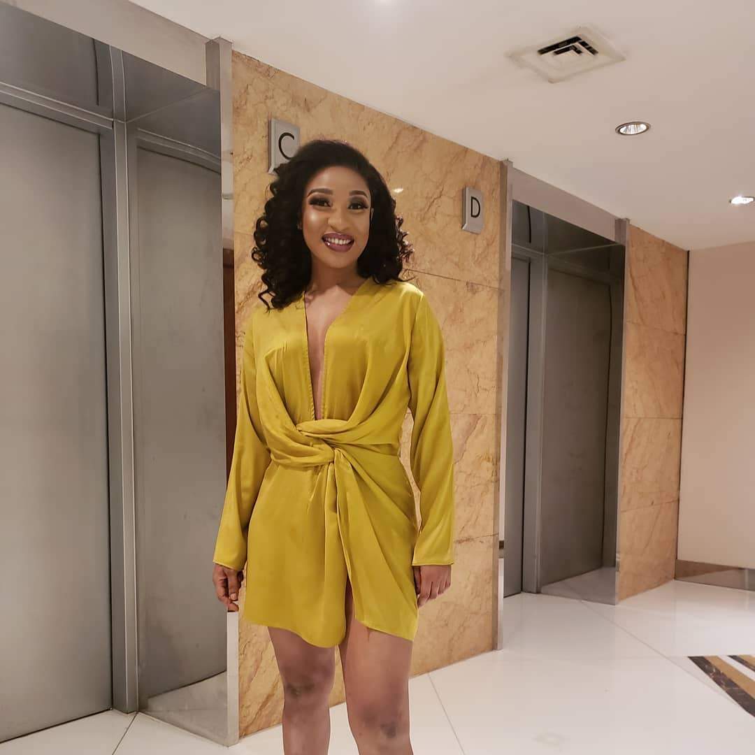 Tonto Dikeh Goes Braless In Plunging Mini Wrap Dress