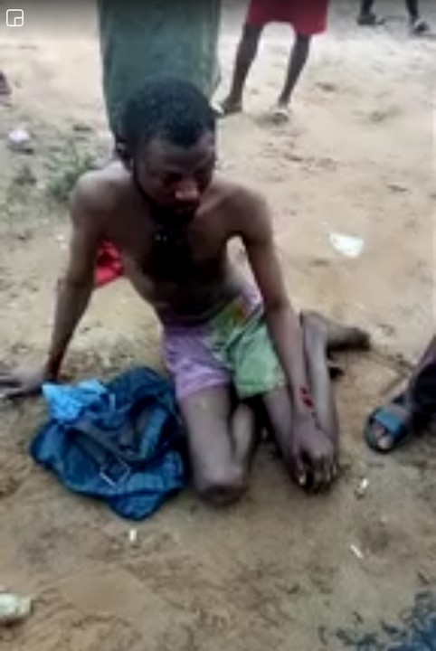 Yahoo Boy Caught Cleaning Someone's Urine With Handkerchief In Delta, Beaten