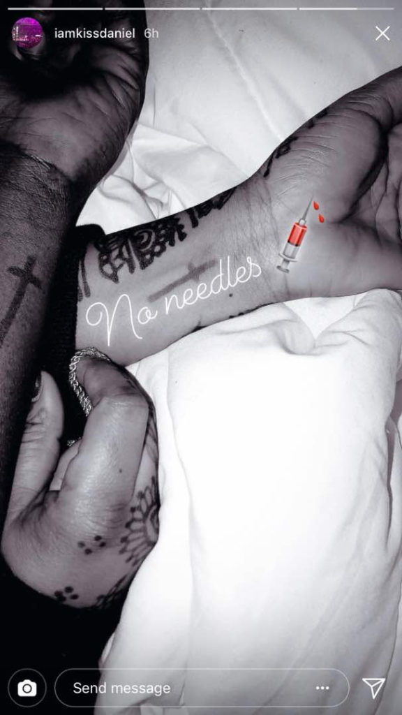 Kiss Daniel and and his girlfriend Chidinma get matching tattoos (Photos + Video)